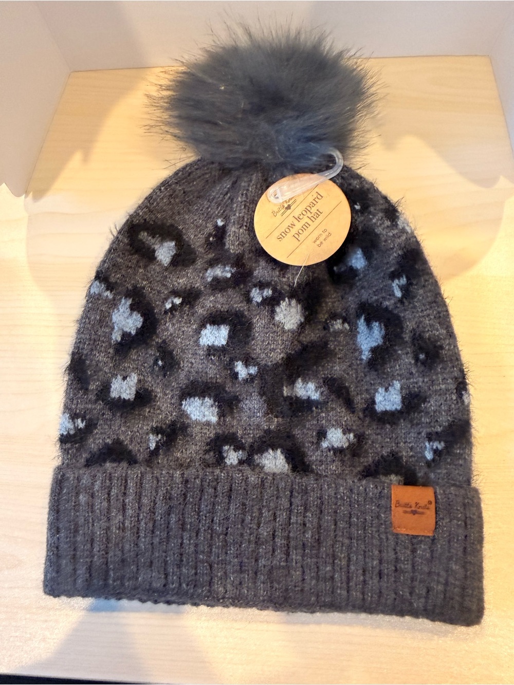 NWT Britt’s Knits Gray and Black Snow Leopard Knit Pom Hat